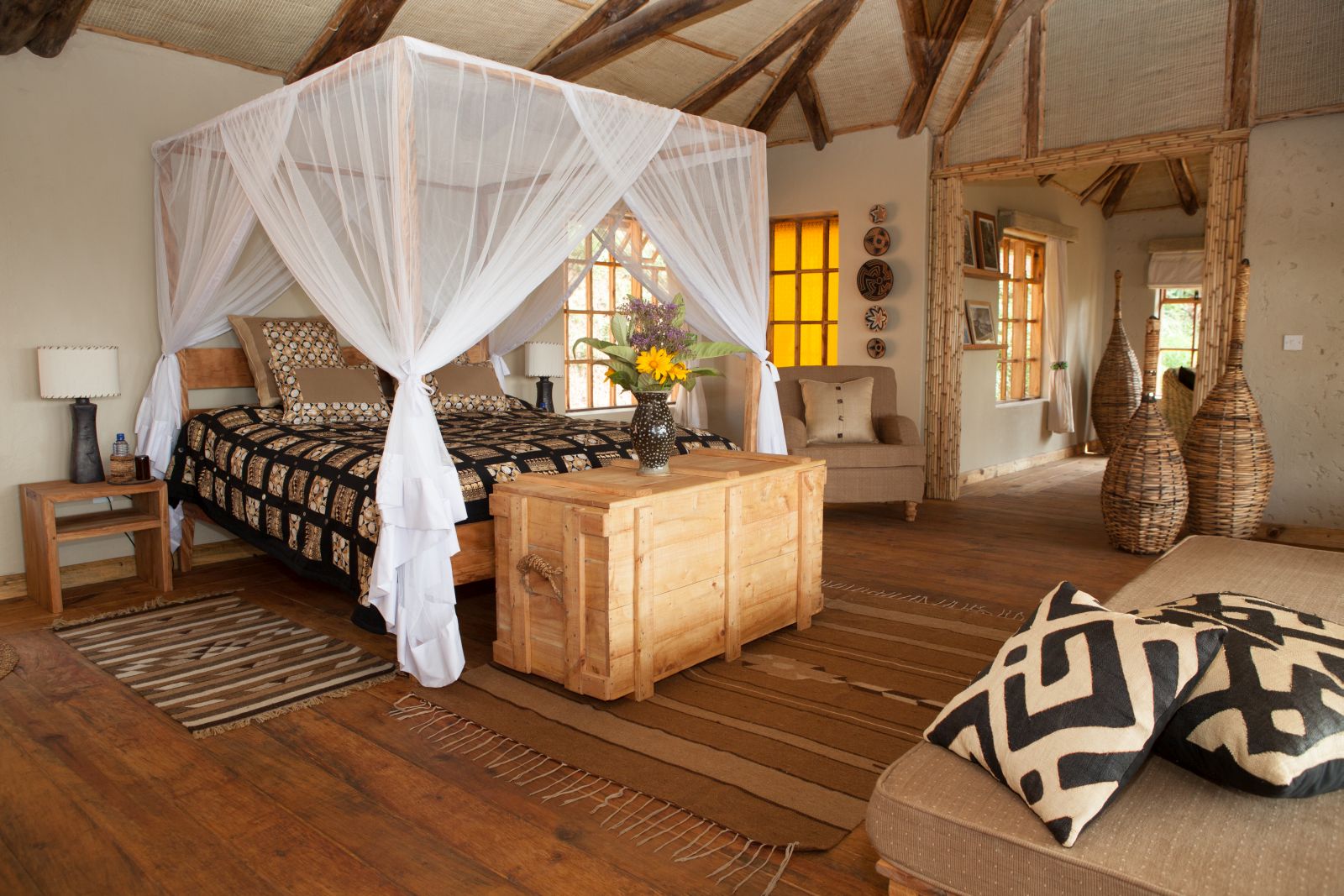 Deluxe banda bedroom at Virunga Lodge in Rwanda