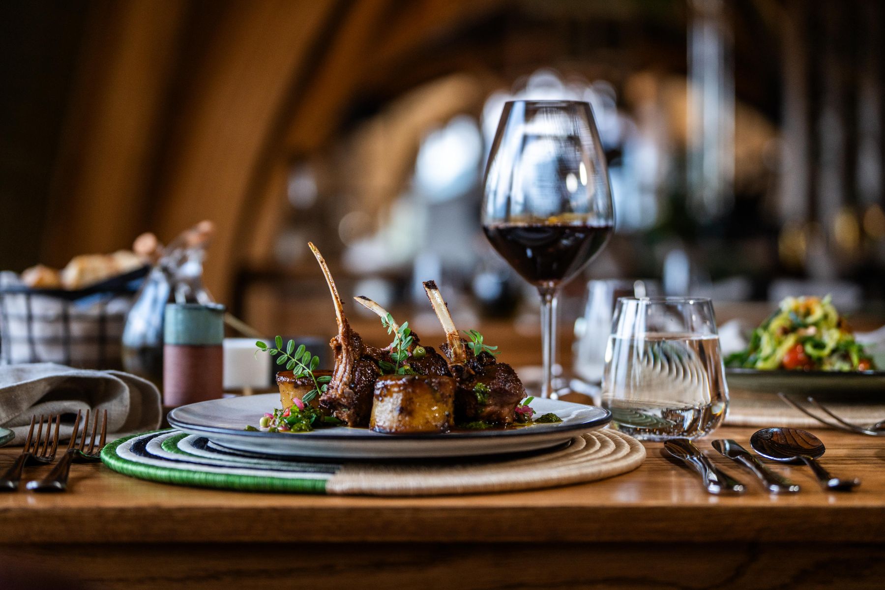 Gourmet dinner and wine at Wilderness Bisate Reserve in Rwanda