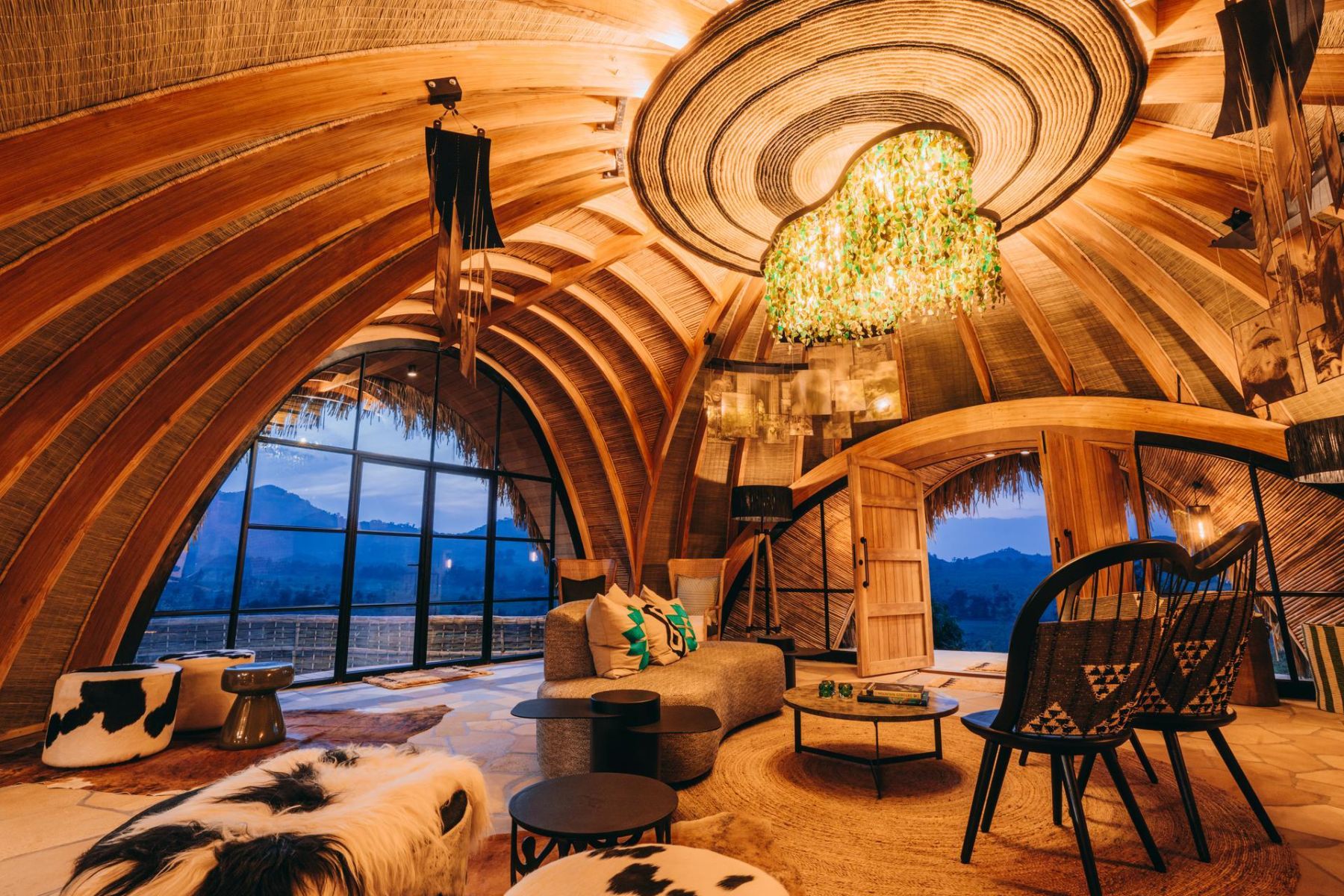 Living area of a suite at Wilderness Bisate Reserve with views of the Volcanoes National Park