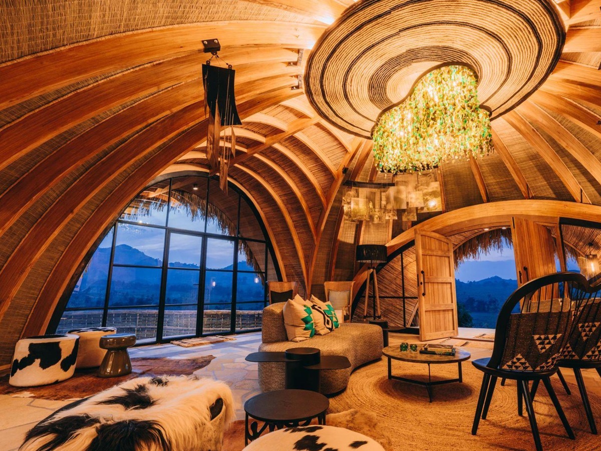 Living area of a suite at Wilderness Bisate Reserve with views of the Volcanoes National Park