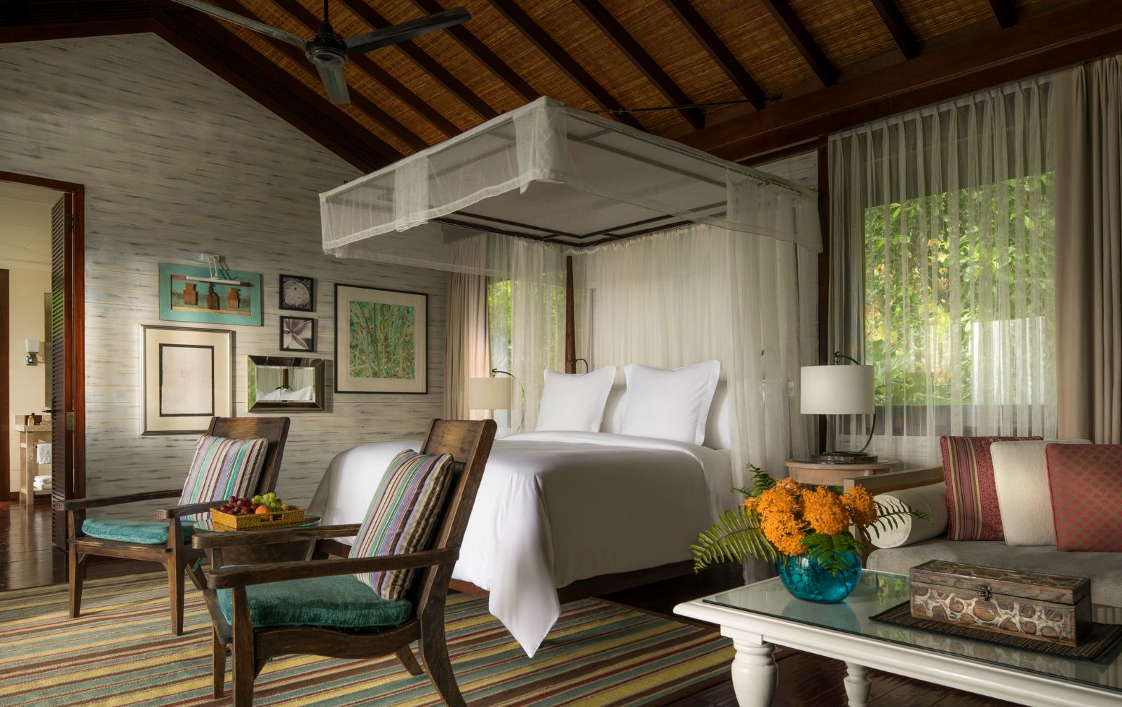 Guest suite bedroom at Four Seasons Seychelles