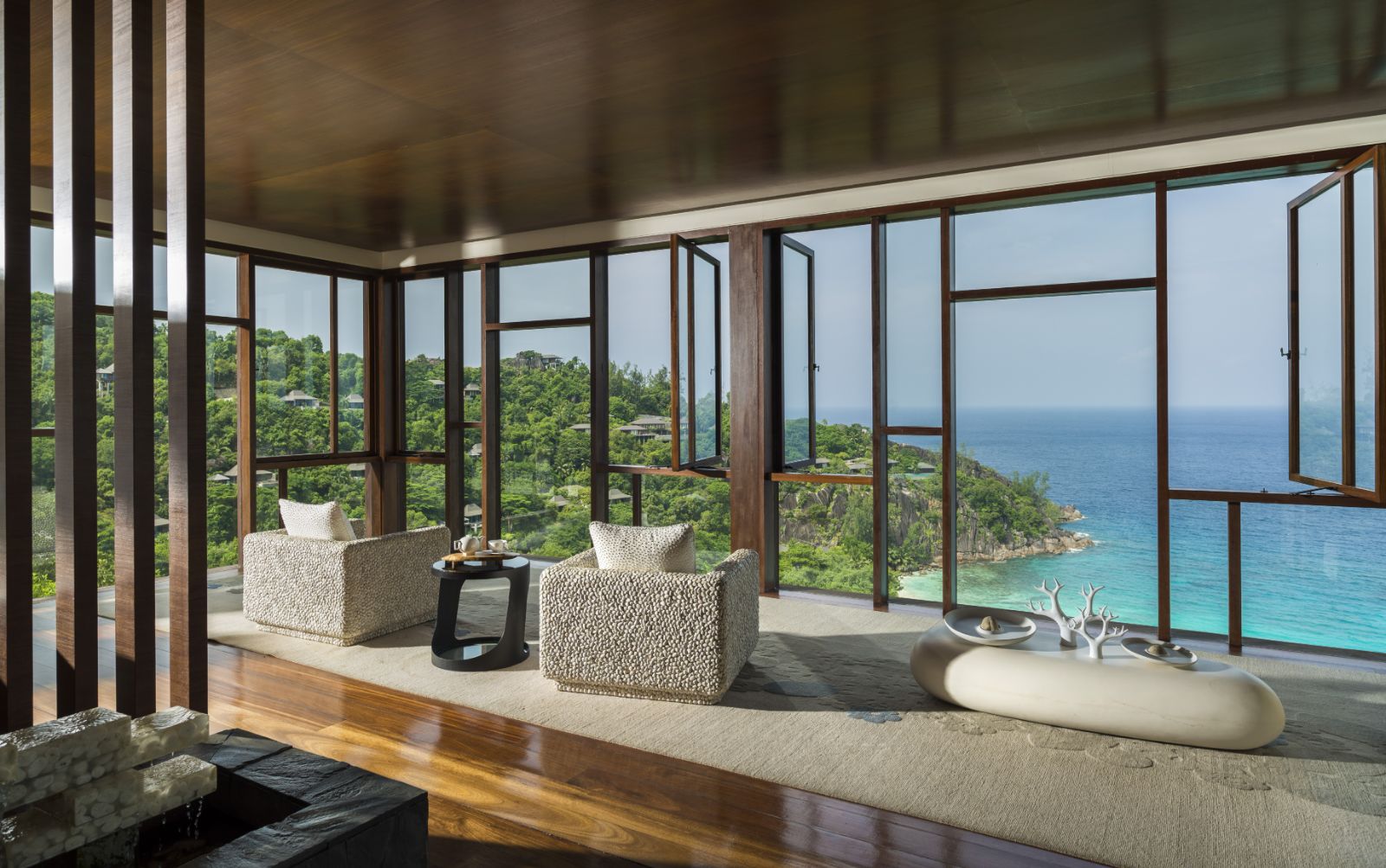 Lounge with views of the ocean at Four Seasons Seychelles