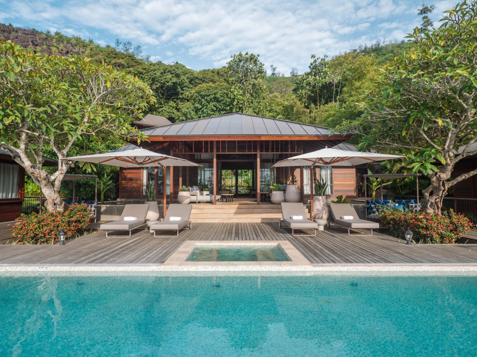Villa exterior and swimming pool at Four Seasons Seychelles