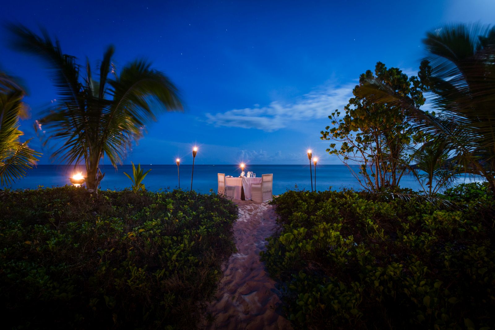 Private dining on the beach on North Island in the Seychelles