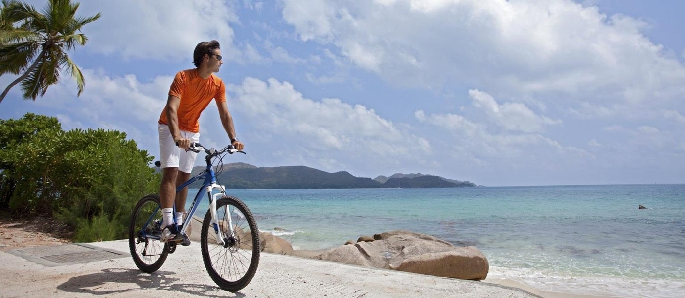 biking on the shores near Raffles, Prasin, Seychelles