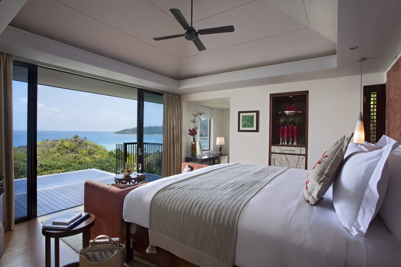 Double bedroom of a pool villa at Raffles, Praslin, Seychelles