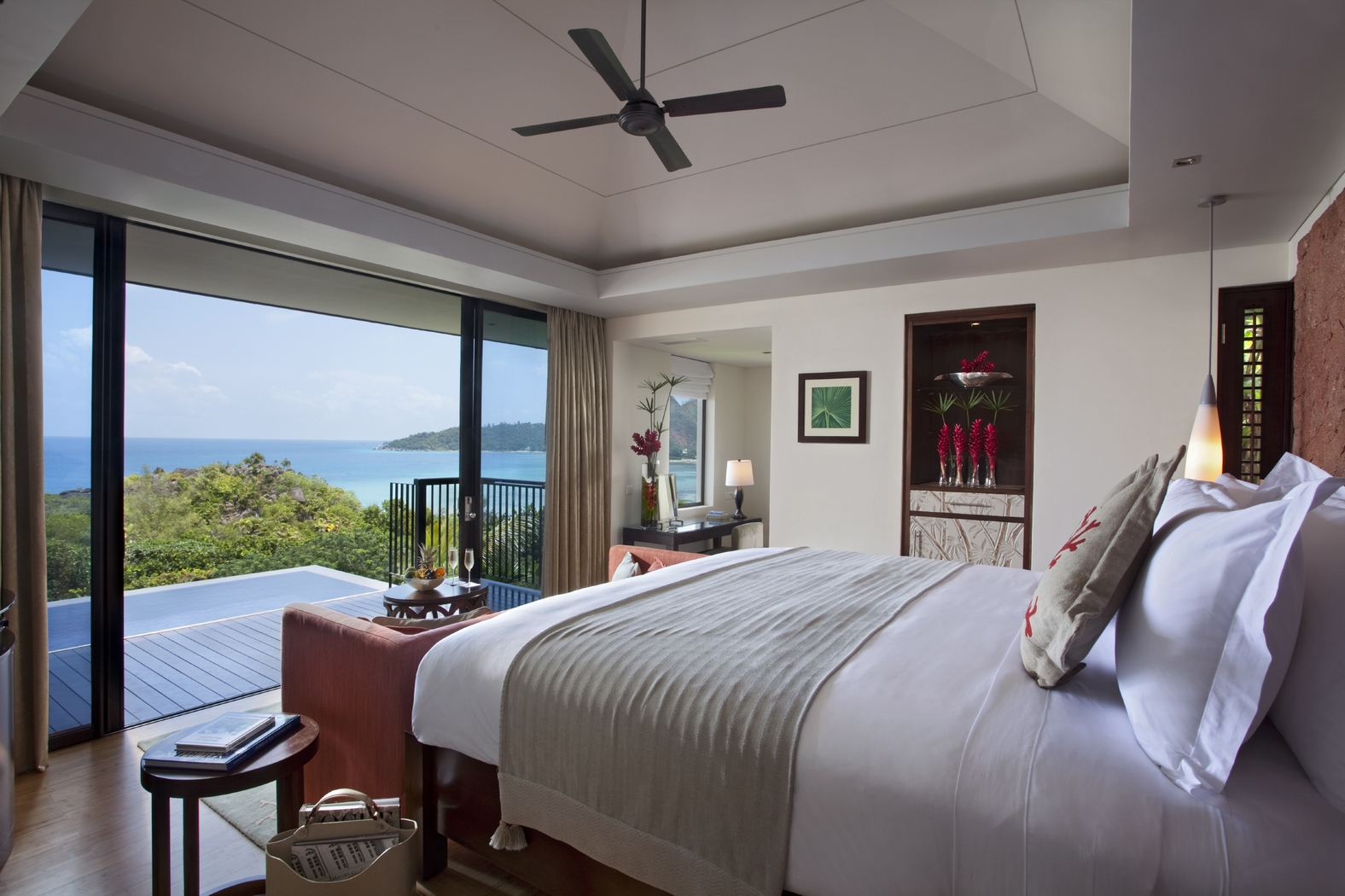 double bedroom of a pool villa at Raffles, Prasin, Seychelles