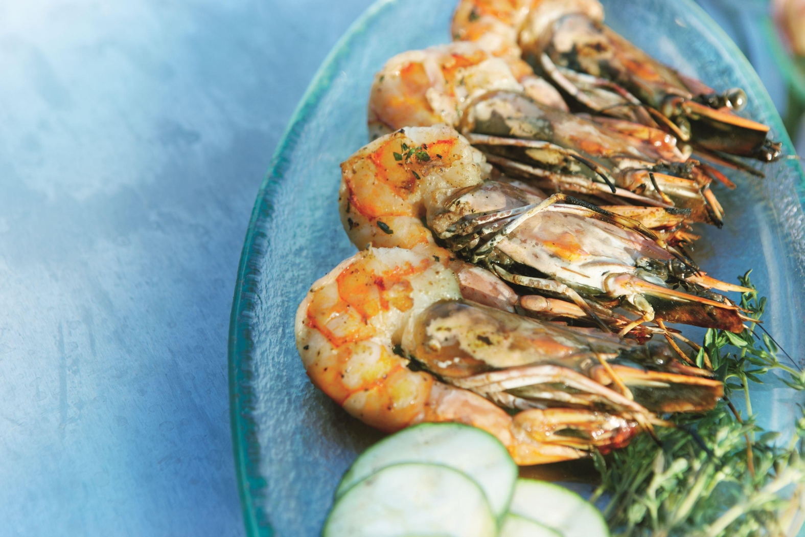 Grilled prawns served at Raffles, Praslin, Seychelles