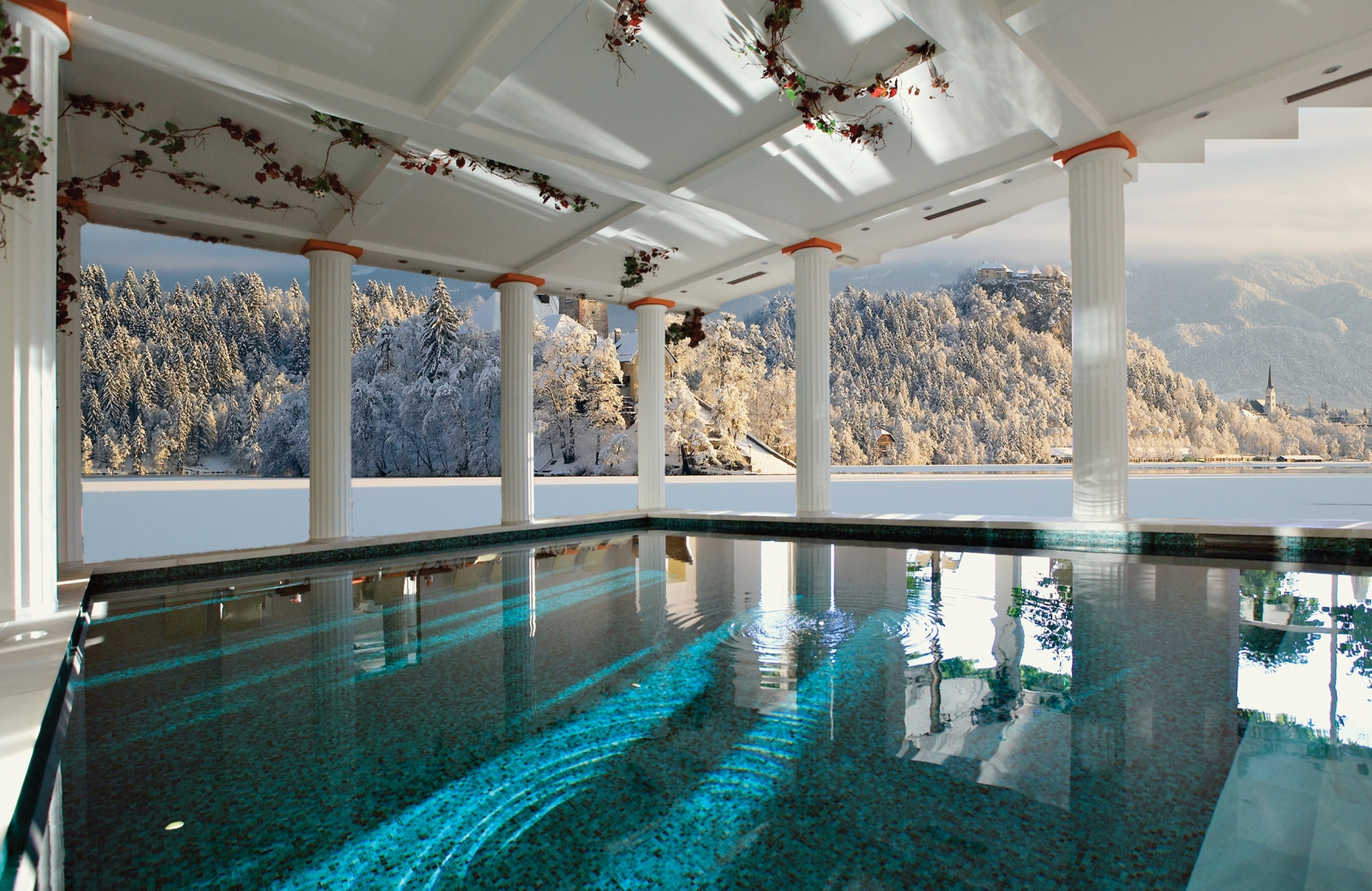 Indoor pool with views of lake at Grand Hotel Toplice in Slovenia