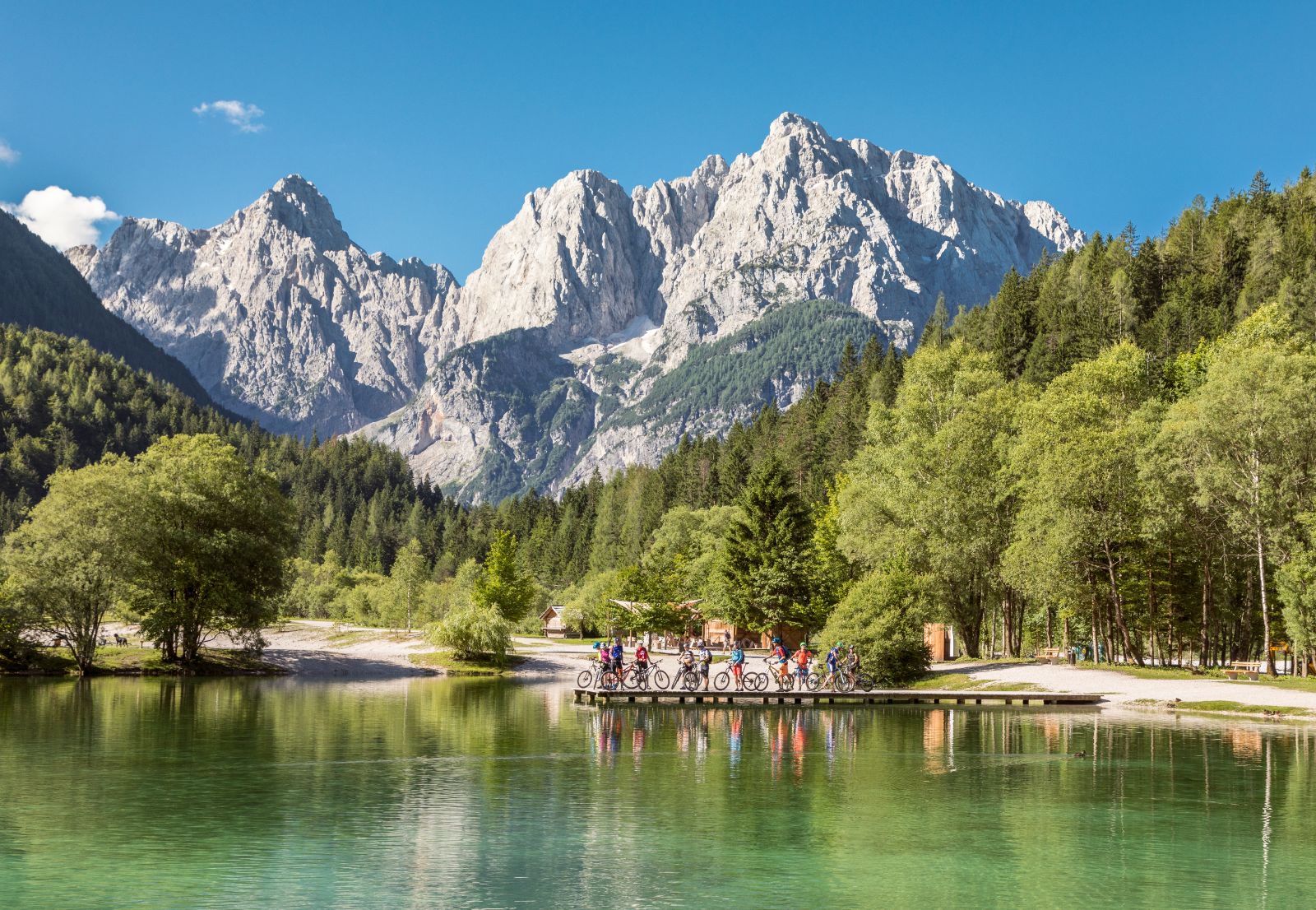 Cyclists in Slovenia's Julian Alps