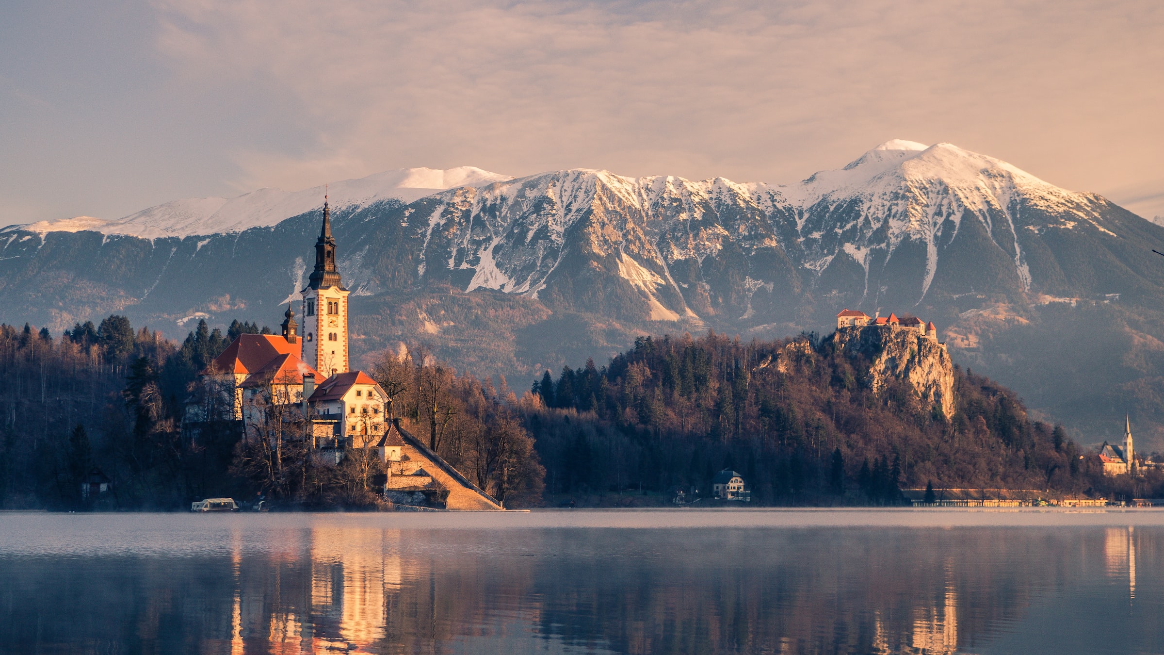 Lake Bled and Bled Castle at sunset in Slovenia