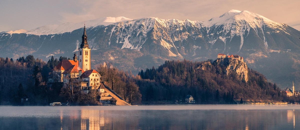 Lake Bled and Bled Castle at sunset in Slovenia
