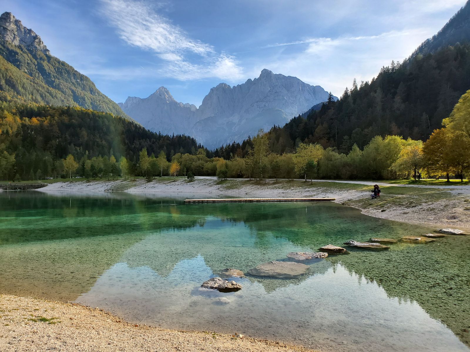 Mountains reflected in the waters of a crystal clear lake in Slovenia