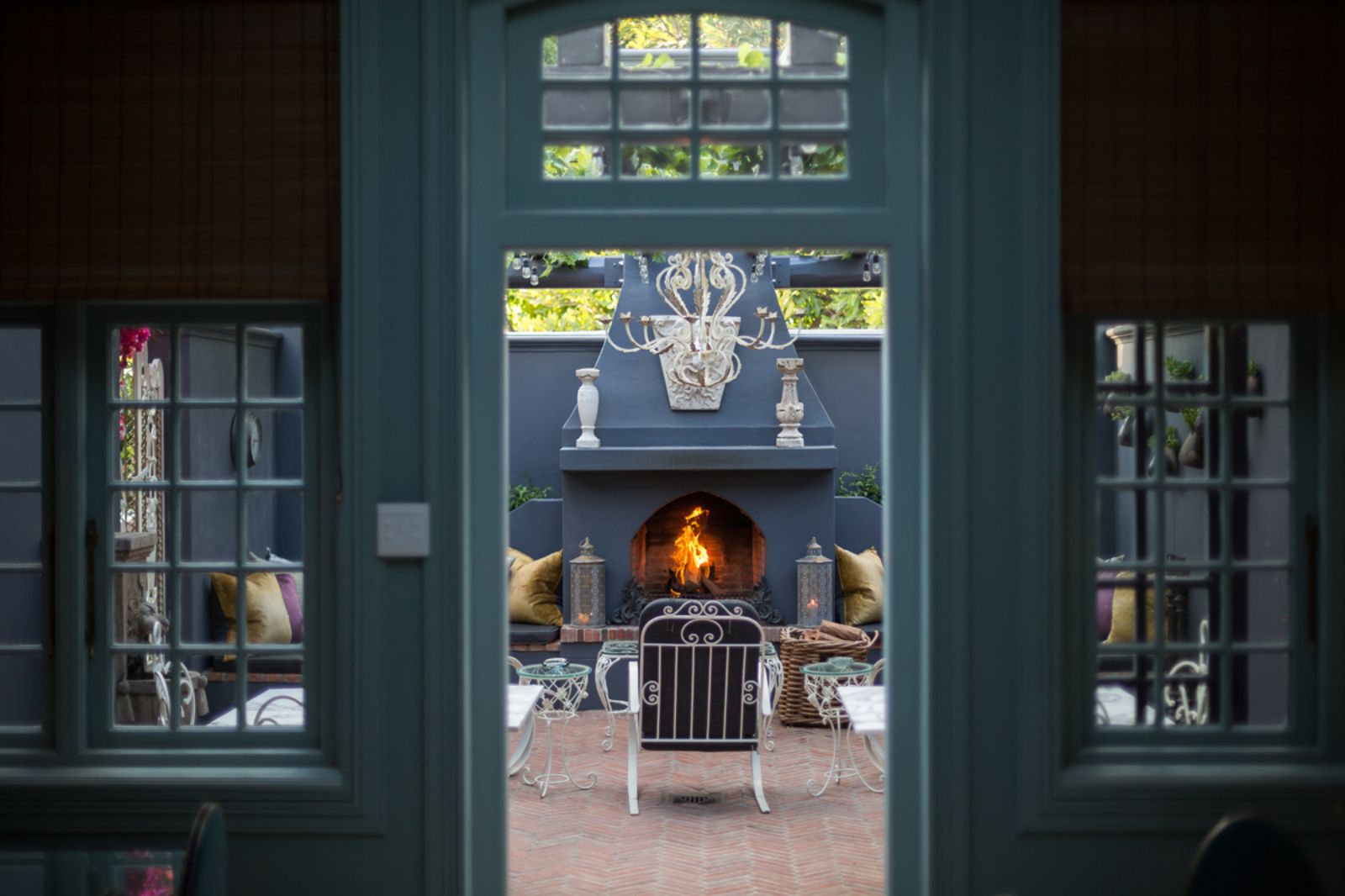 Courtyard and fireplace at Akademie Street Boutique Hotel in Cape Town