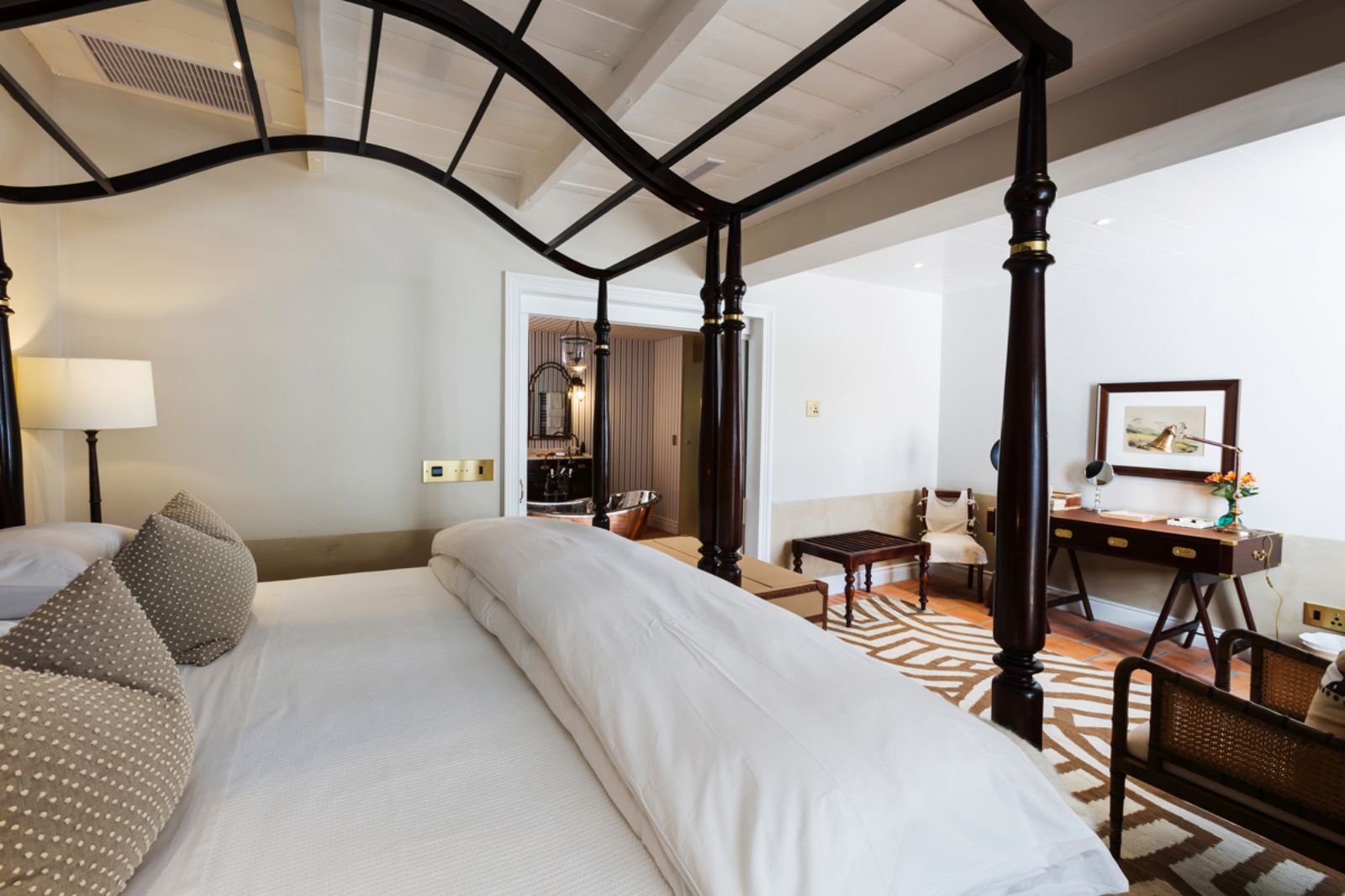 Bedroom of Oortuiging suite at Akademie Street Boutique Hotel in Cape Town