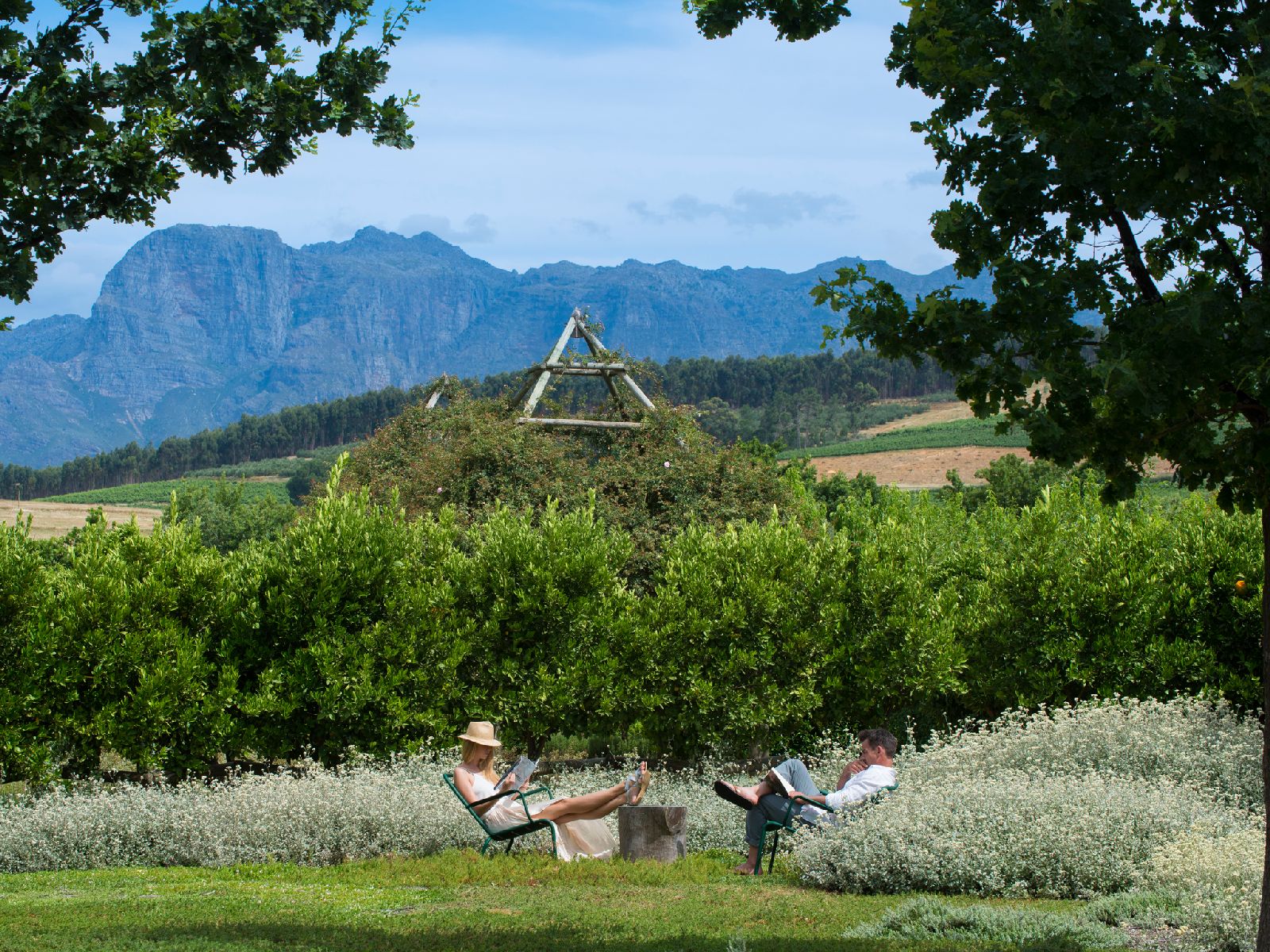 Guests relaxing in the gardens at Babylonstoren in South Africa