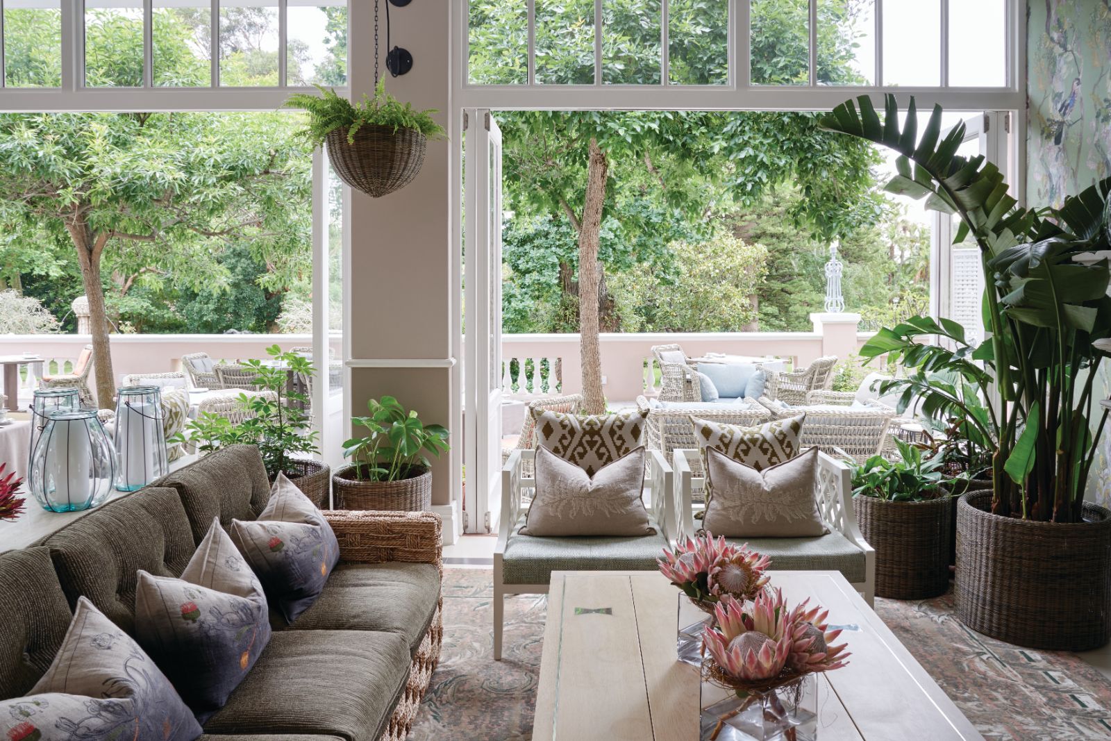 The stylish Lounge at luxury hotel Belmond The Mount Nelson overlooking the gardens
