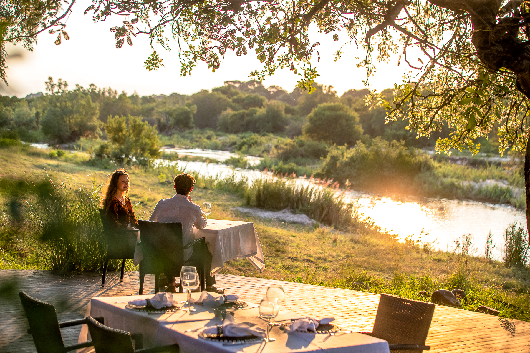 A couple dining at Dulini River Lodge in South Africa