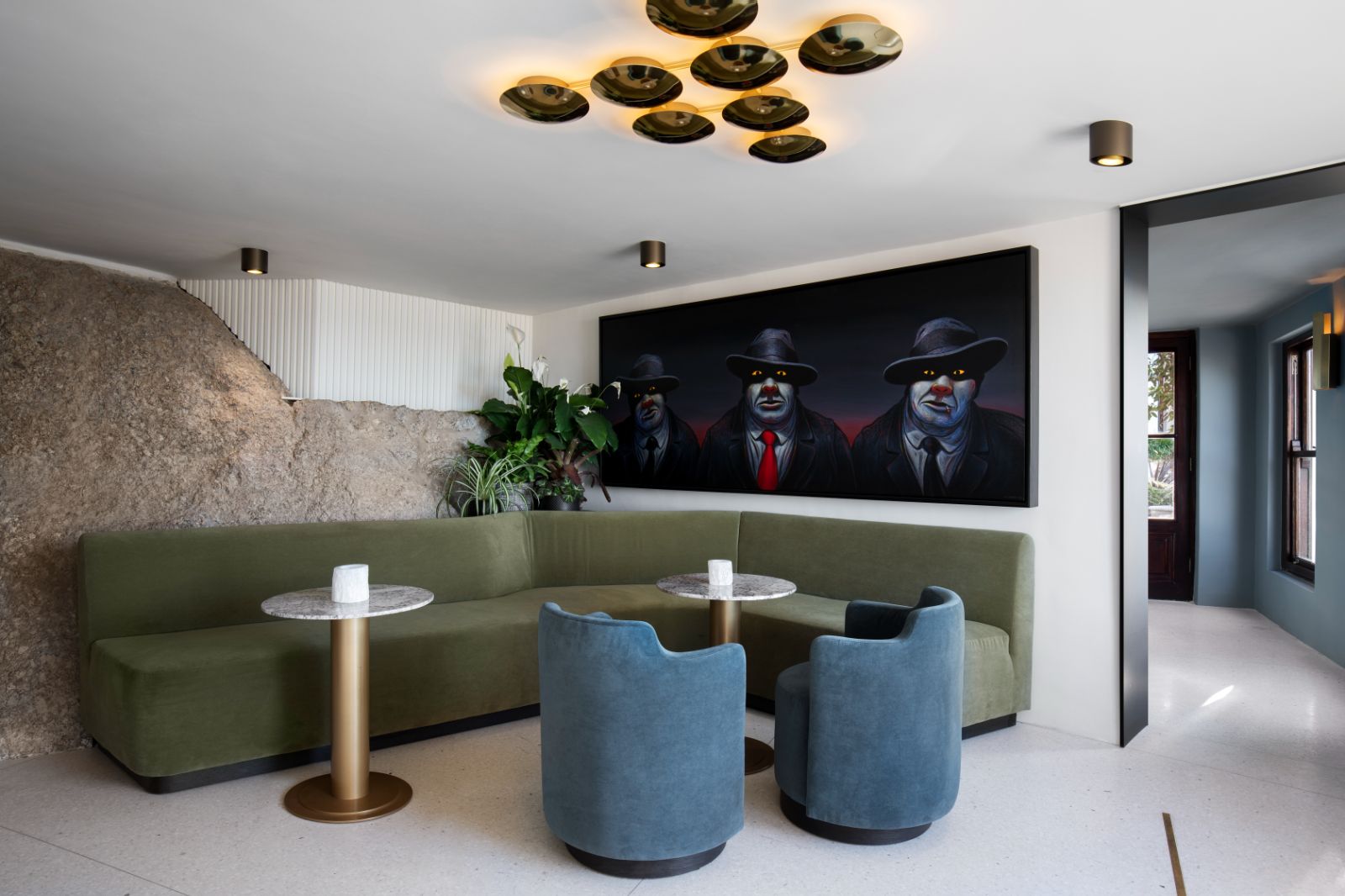 Seating area with artwork at Bar Roc, in luxury hotel Ellerman House in Cape Town
