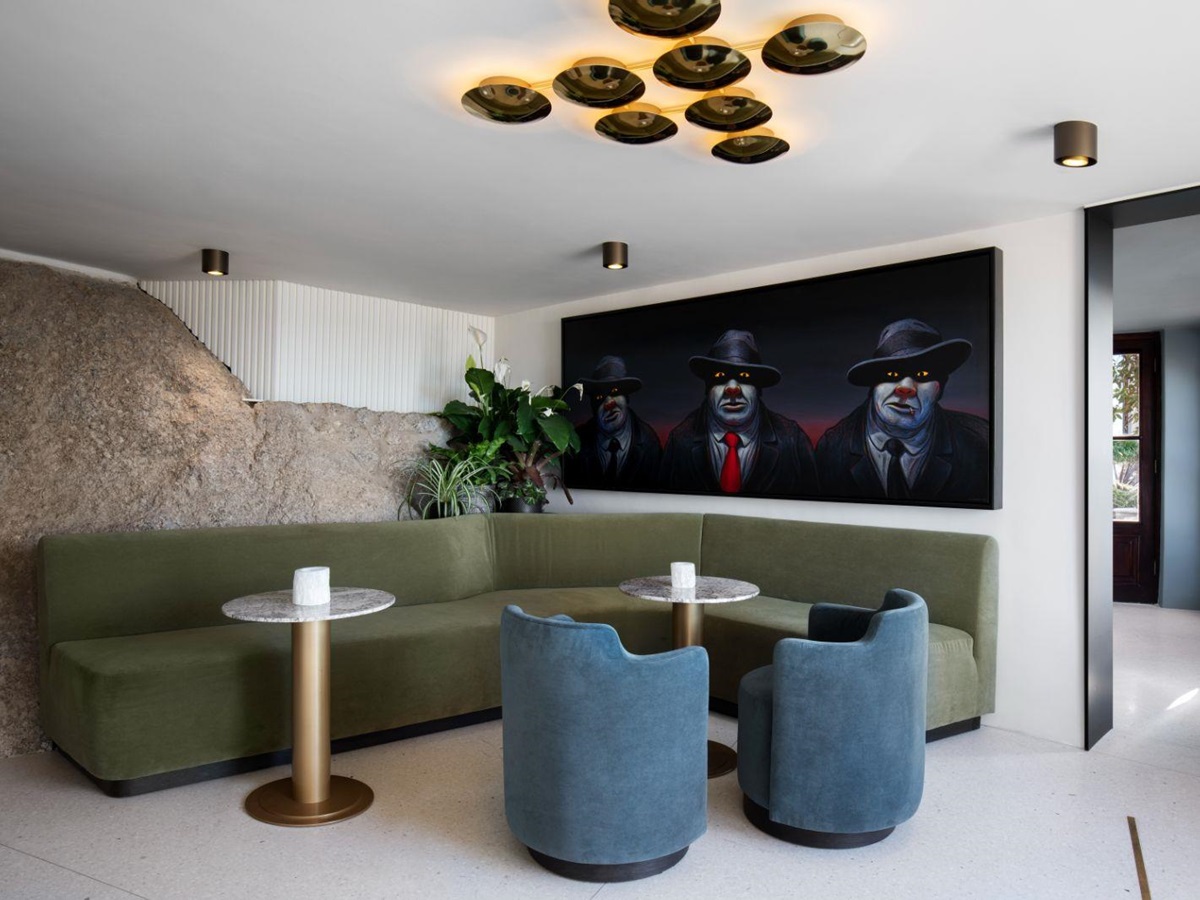 Seating area with artwork at Bar Roc, in luxury hotel Ellerman House in Cape Town