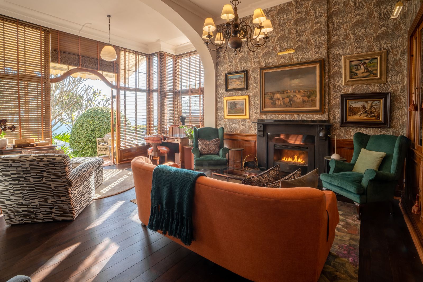 Cosy Library with direct access to the gardens of luxury hotel Ellerman House in Cape Town