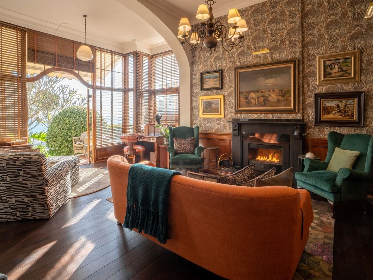 Cosy Library with direct access to the gardens of luxury hotel Ellerman House in Cape Town
