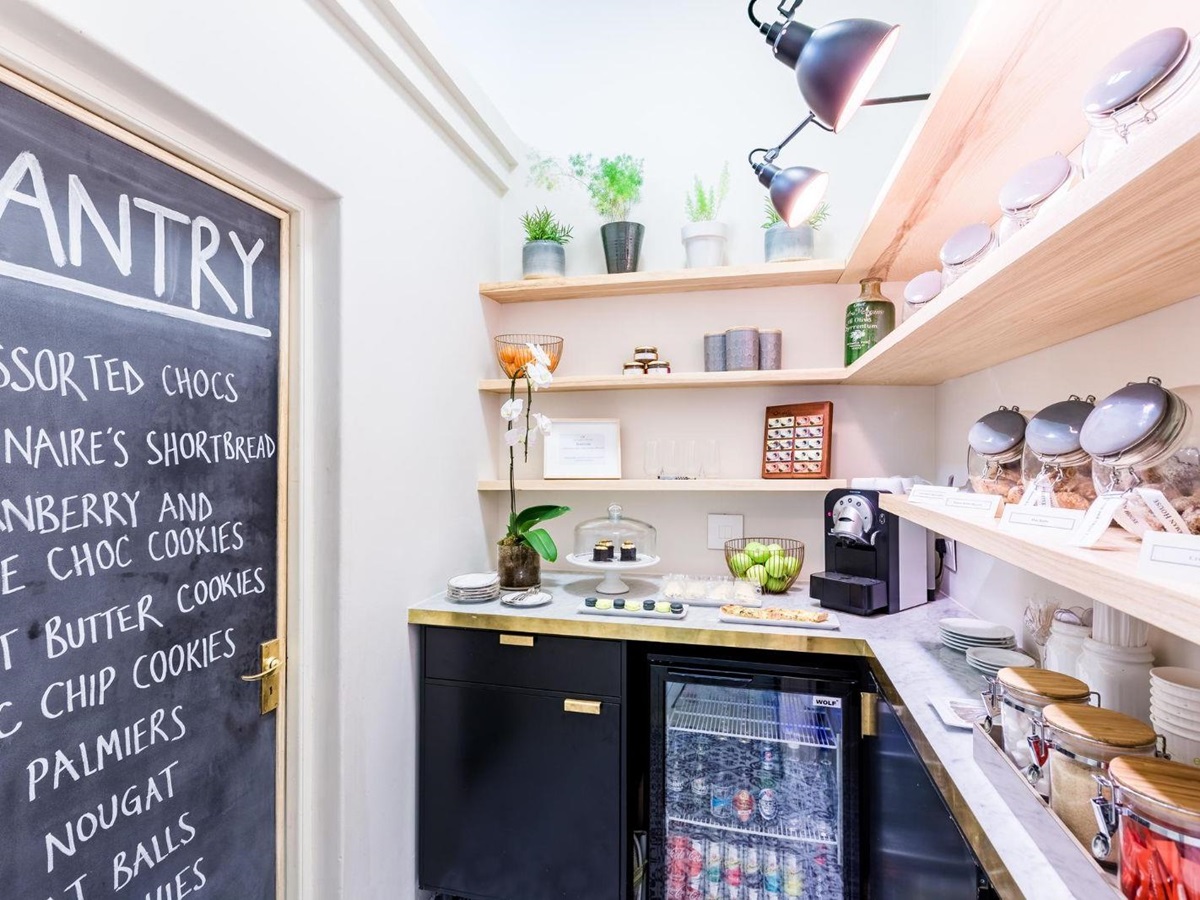 fully stocked pantry with sweet and savoury snacks at luxury hotel Ellerman House in Cape Town South Africa