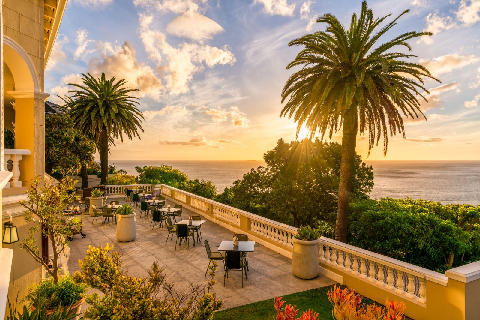 sunset view on dining terrace balcony at luxury hotel Ellerman House in Cape Town South Africa