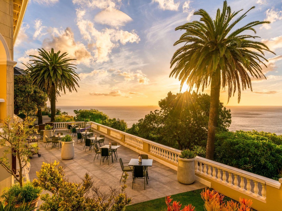 sunset view on dining terrace balcony at luxury hotel Ellerman House in Cape Town South Africa
