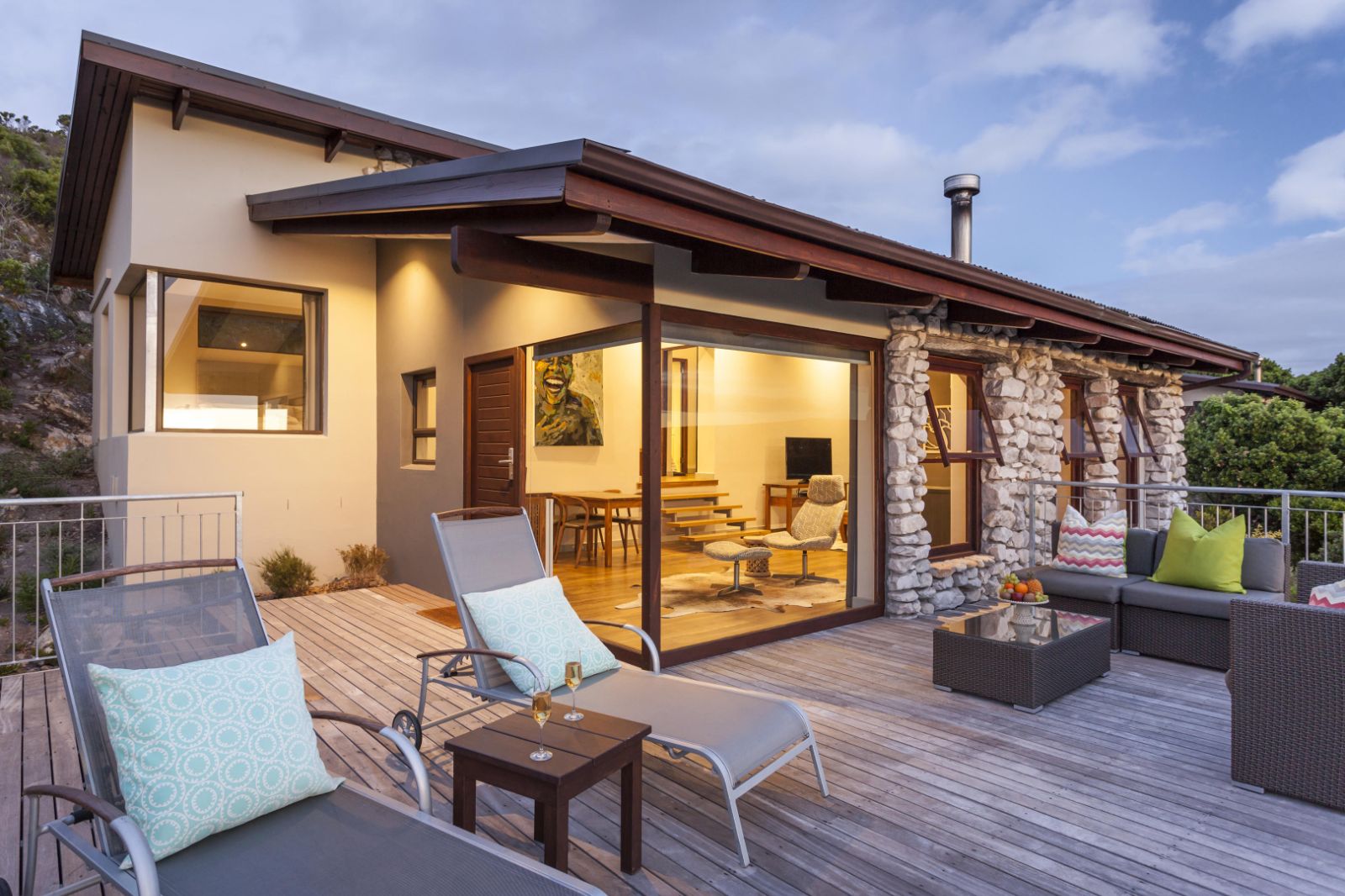 Garden lodge lounge deck area at luxury lodge Grootbos Garden Lodge in South Africa