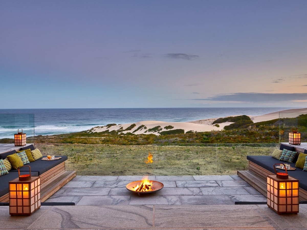 Firepit with ocean views at Morukuru Beach Lodge in the De Hoop Nature Reserve