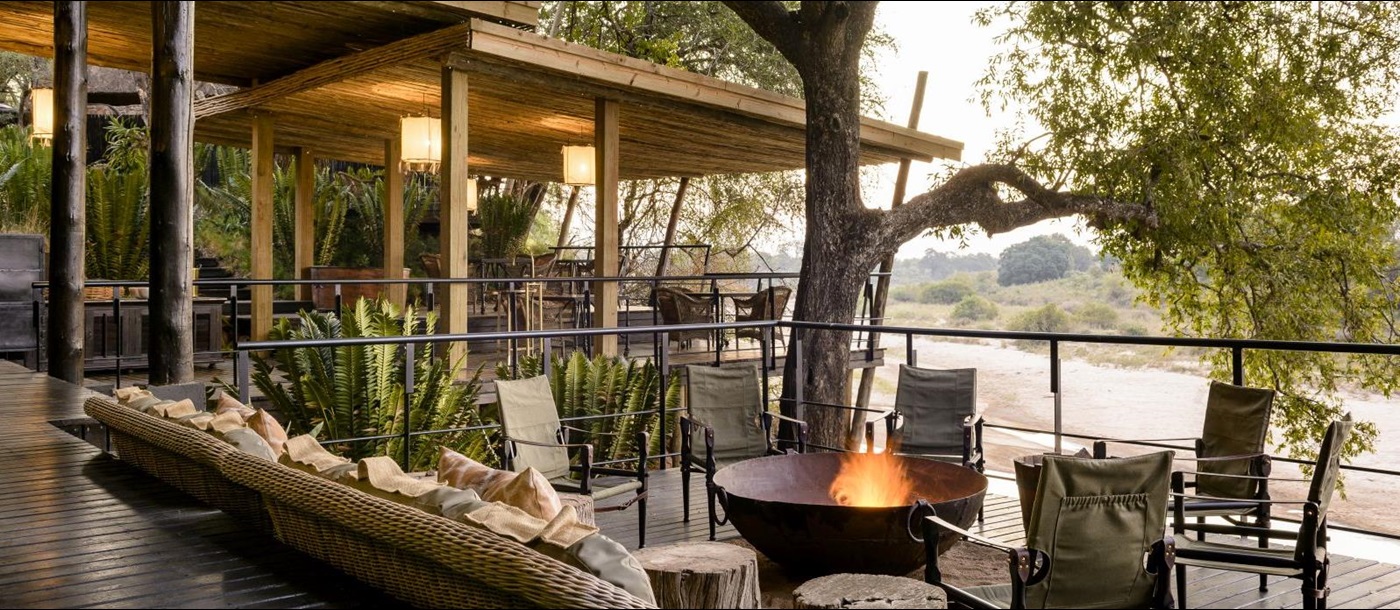Deck with campfire at Singita Ebony Lodge in South Africa