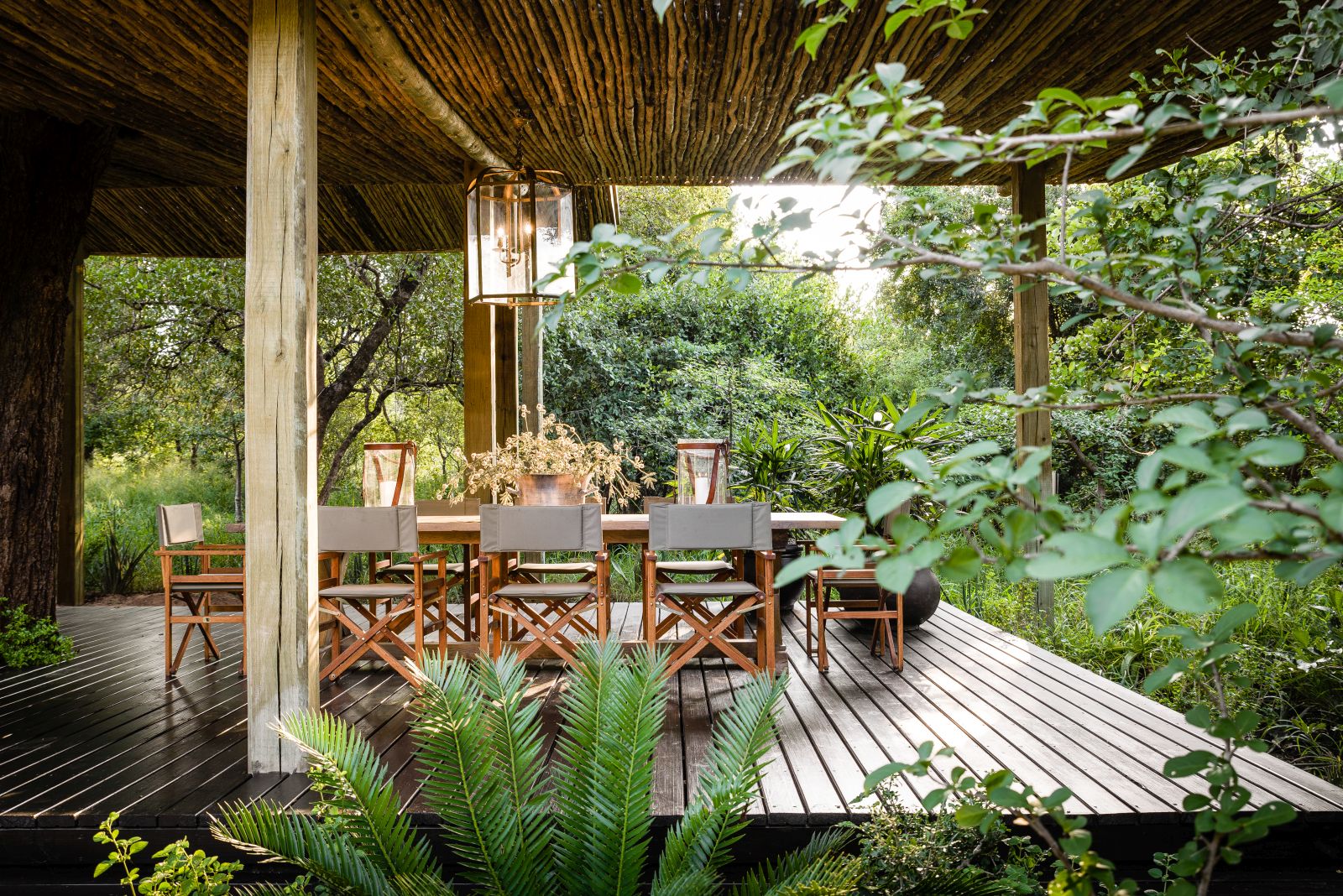 Dining on the outdoor deck at Singita Ebony Lodge in South Africa