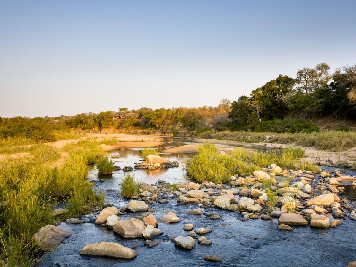 View across the river of Singita Ebony Lodge in South Africa