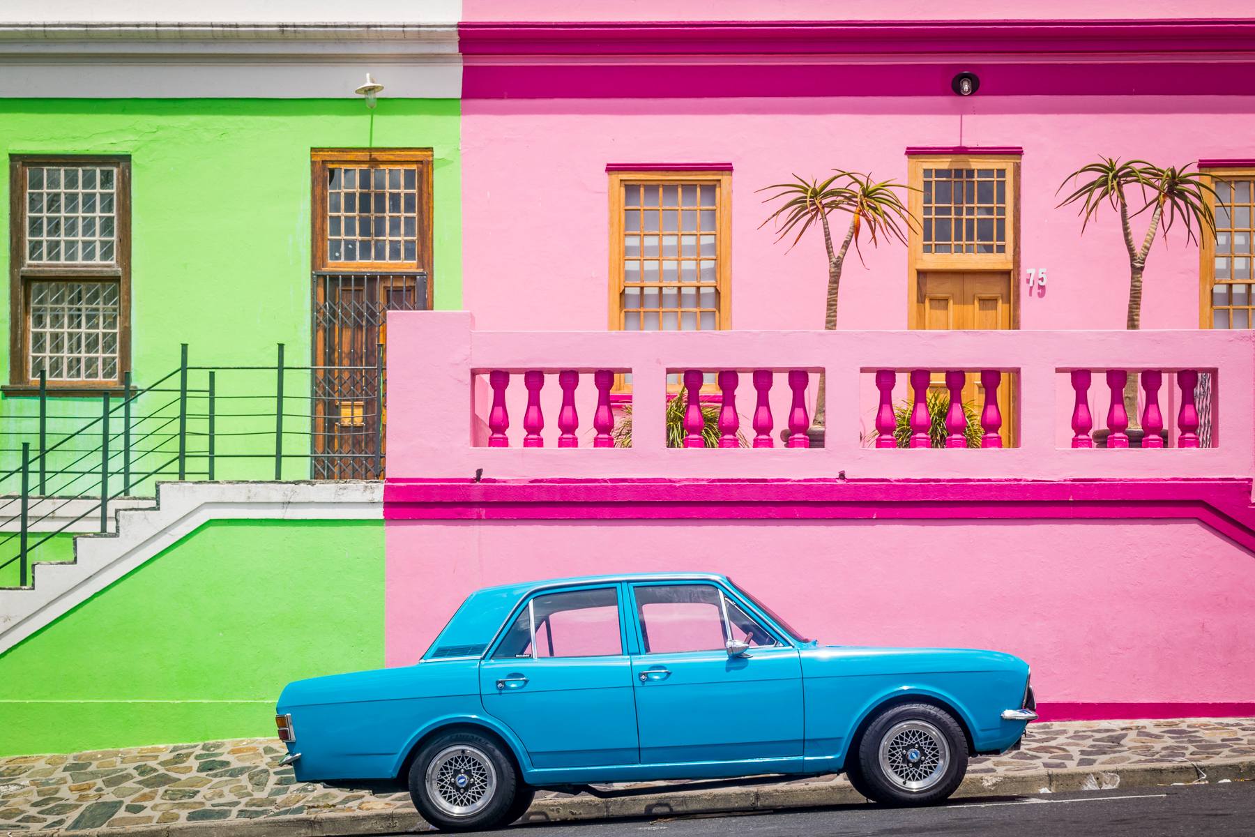 A car park in front of colourful houses in Cape Town's Bo Kaap district