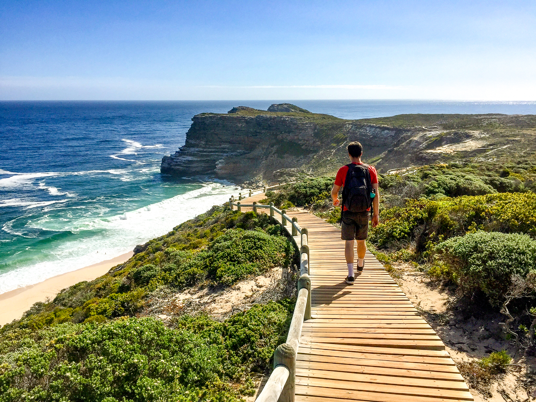 A man walking along Cape Point in South Africa
