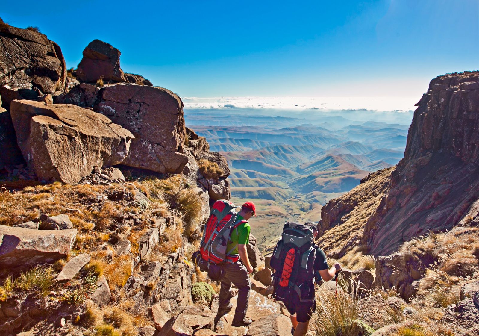 Two hikers in the Drakensberg Mountains, South Africa. Photo by Grant Pitcher