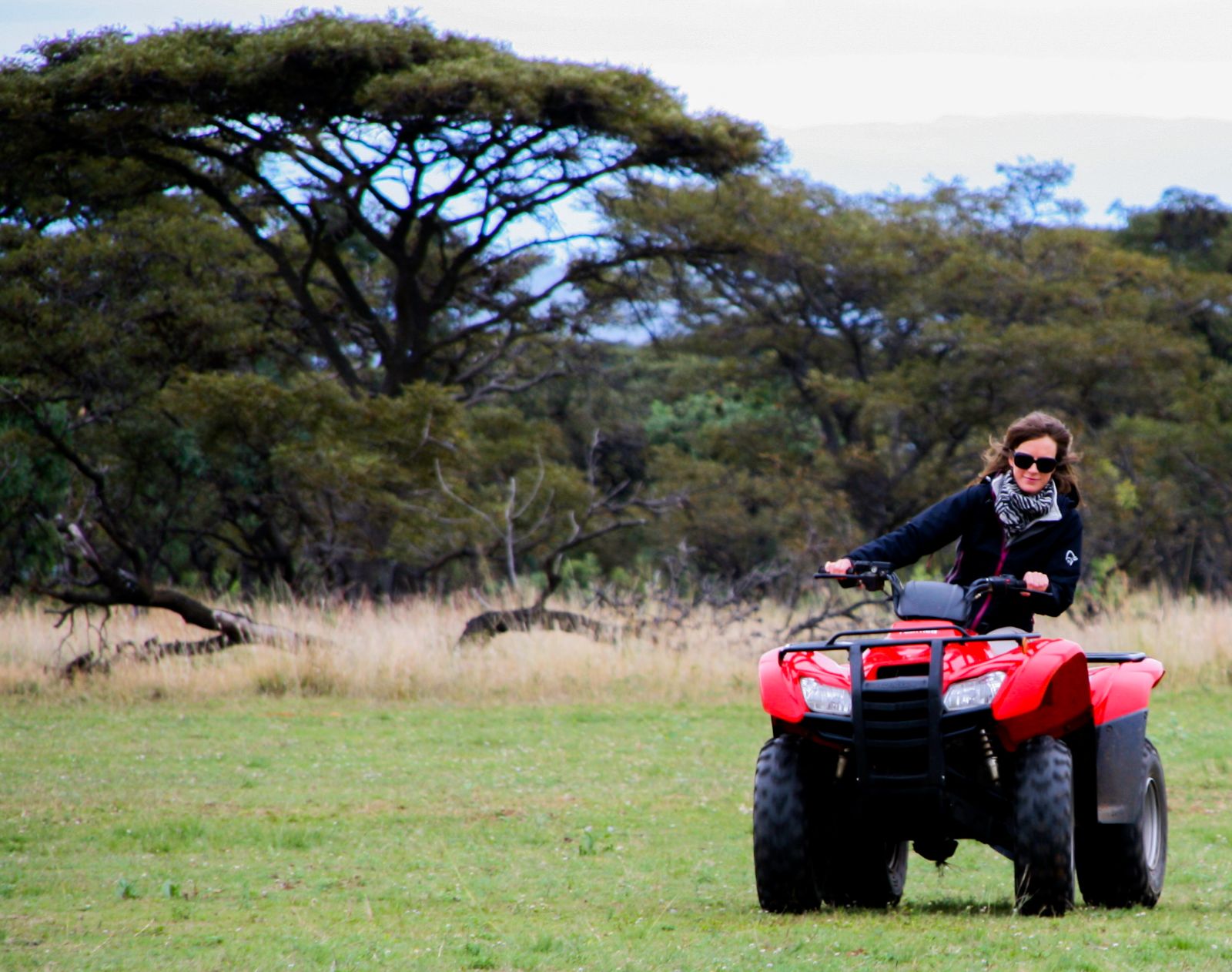 Guest exploring the reserve by quad bike during a stay at luxury private house Leobo The Observatory in South Africa