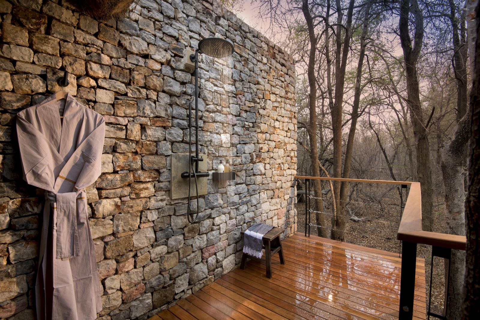 Private outdoor shower at luxury private house Morukuru River House in the Madikwe Game Reserve in South Africa