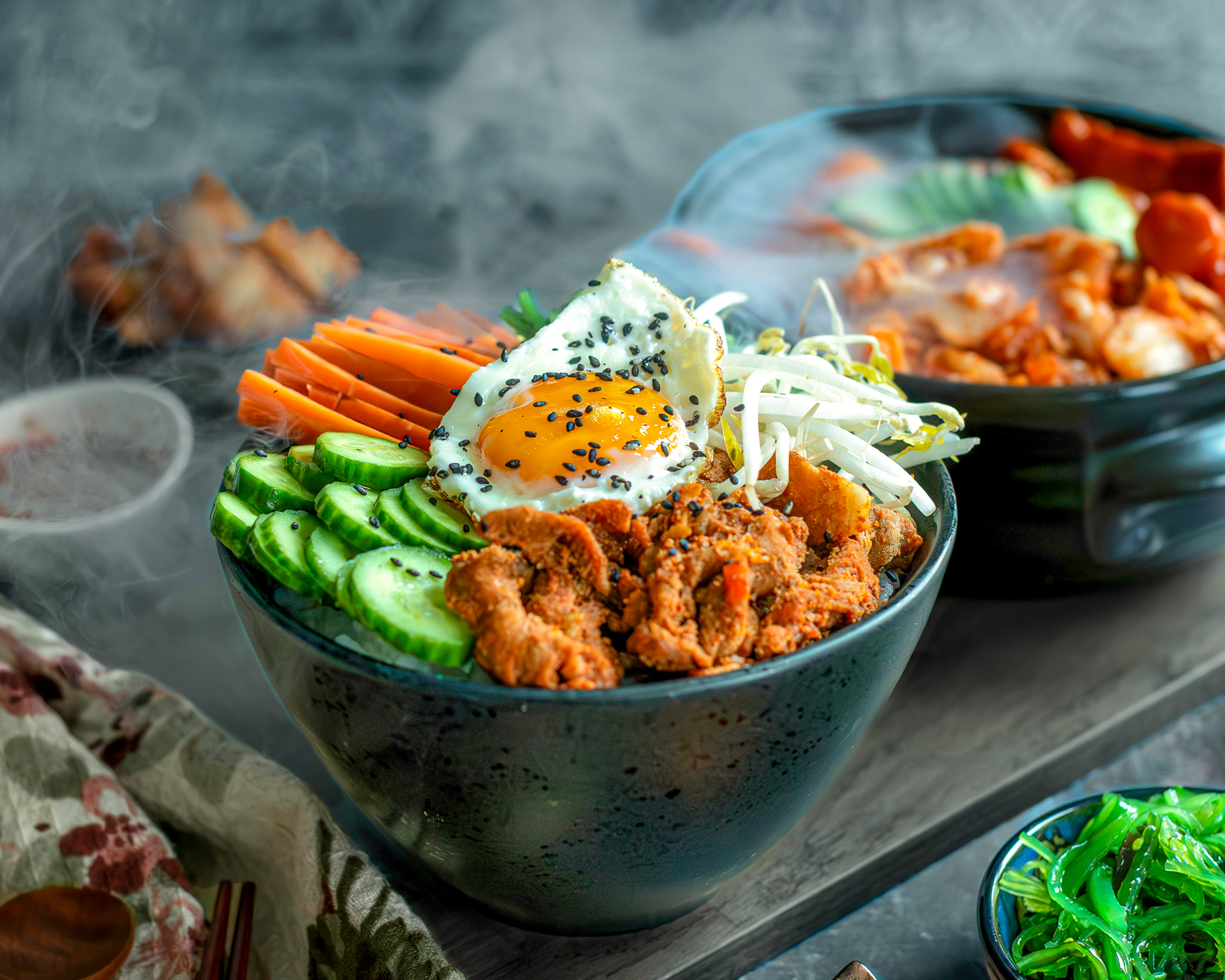 Steaming bowl of freshly served bibimbap