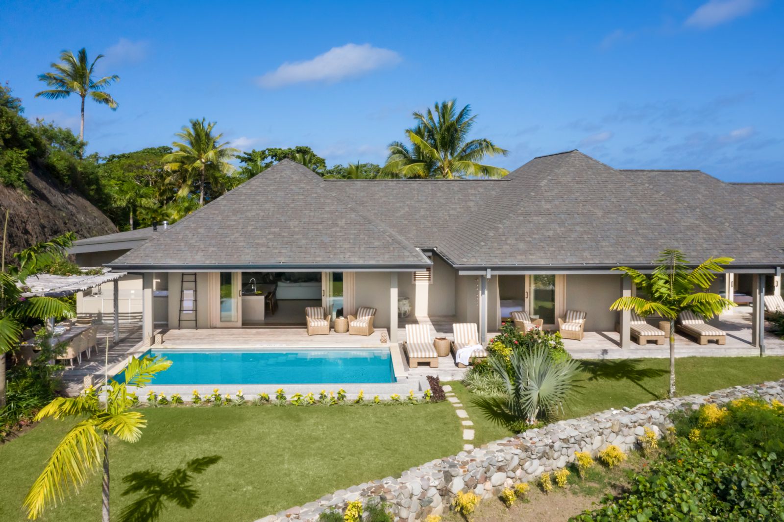 Exterior view of the Namara Residence with private pool at luxury resort Kokomo Island in Fiji