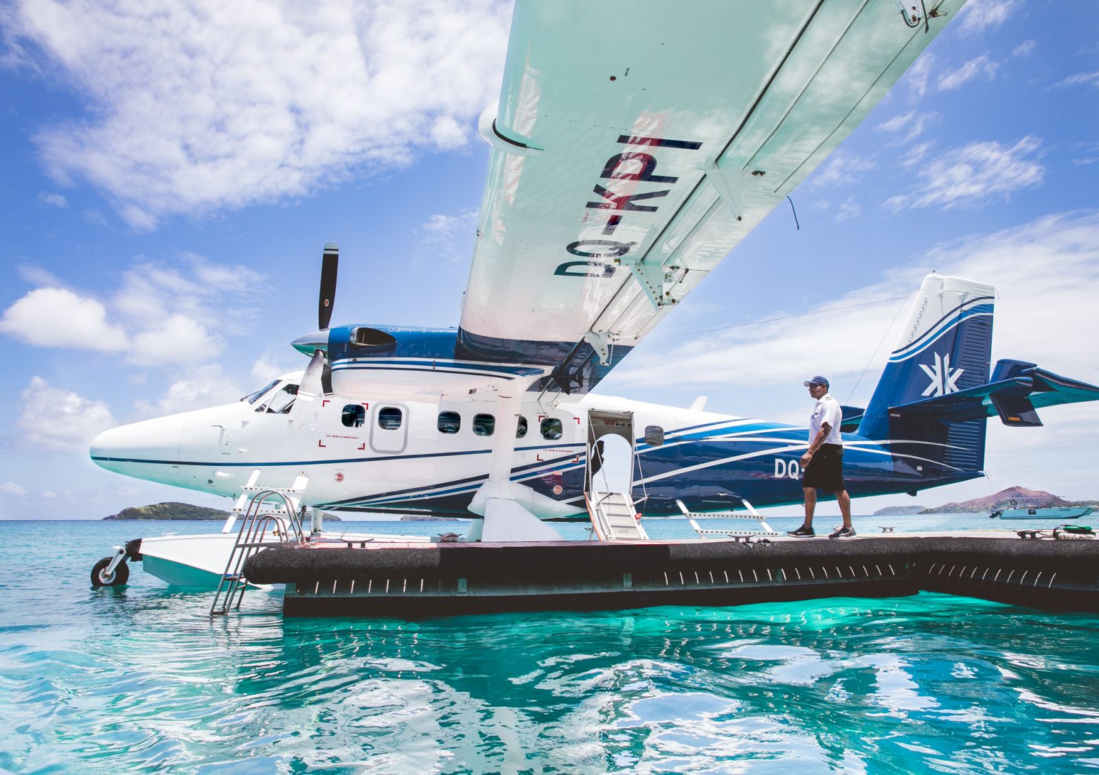 Seaplane on the jetty of luxury resort Kokomo Island in Fiji