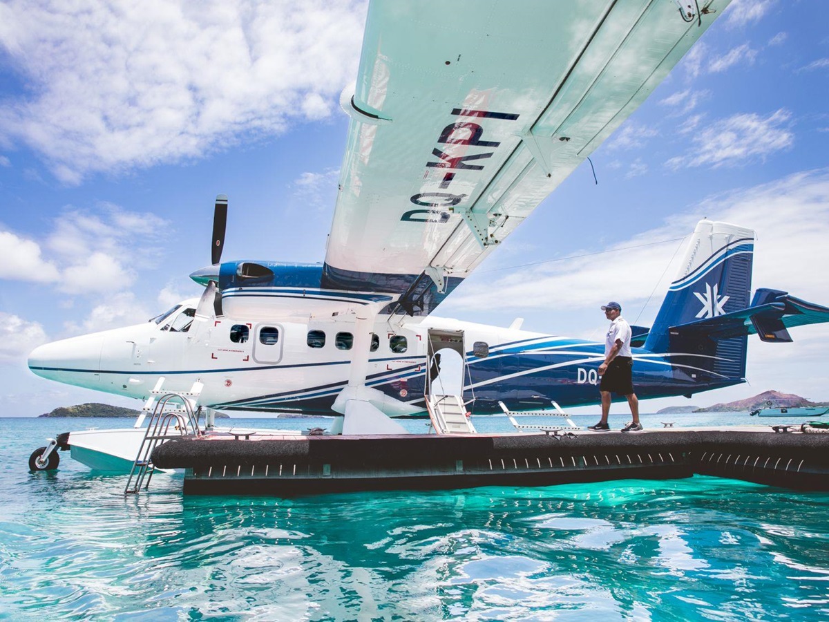 Seaplane on the jetty of luxury resort Kokomo Island in Fiji