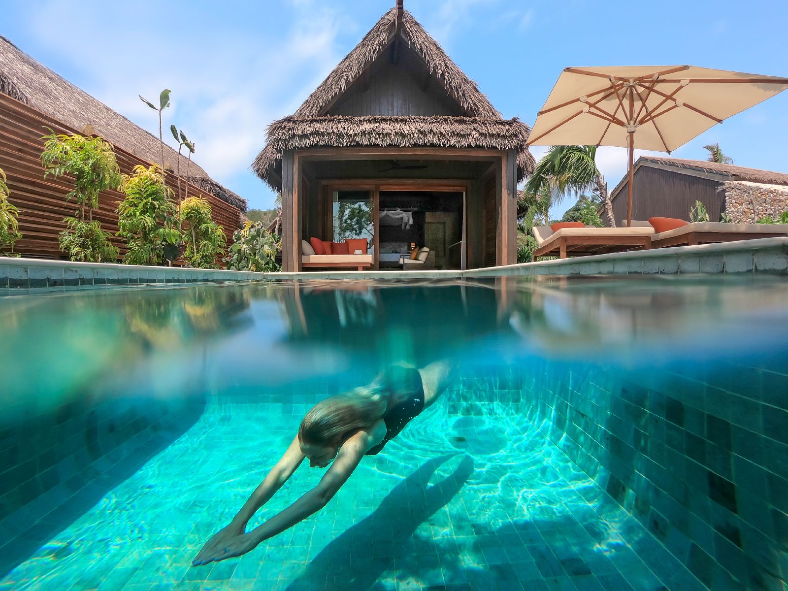 Guest enjoying their private plunge pool at the Six Senses Fiji