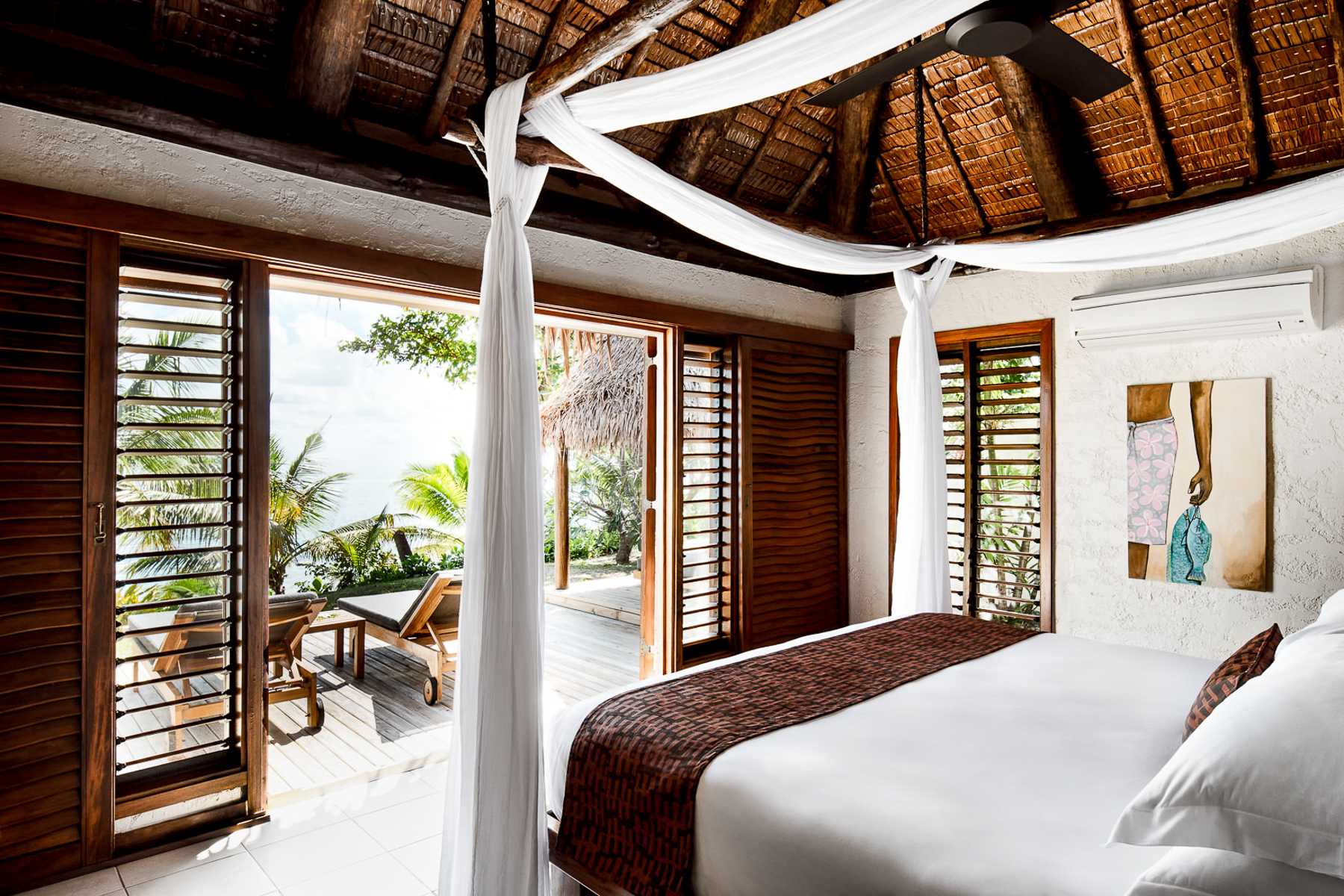 Beachfront pool villa bedroom at Tokoriki Island Resort in Fiji