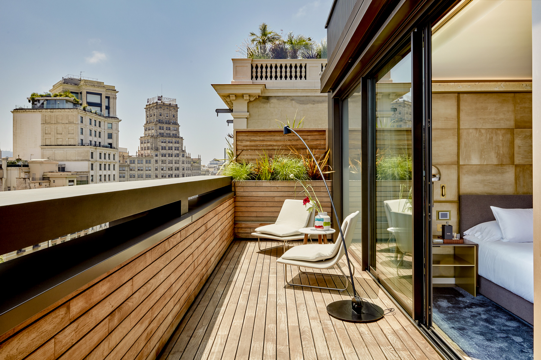 Terrace suite balcony overlooking the city at the Almanac Barcelona hotel