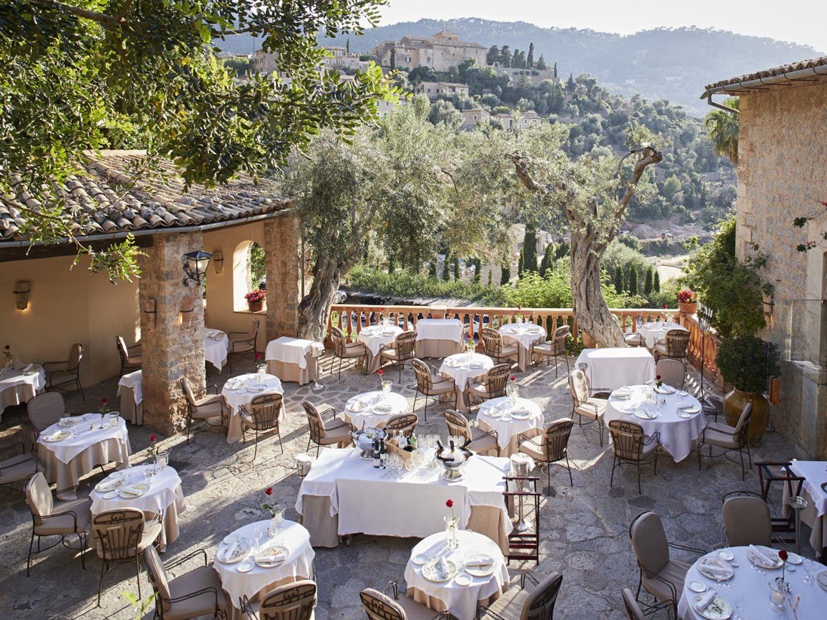 Dining on the terrace at Belmond La Residencia hotel in Mallorca