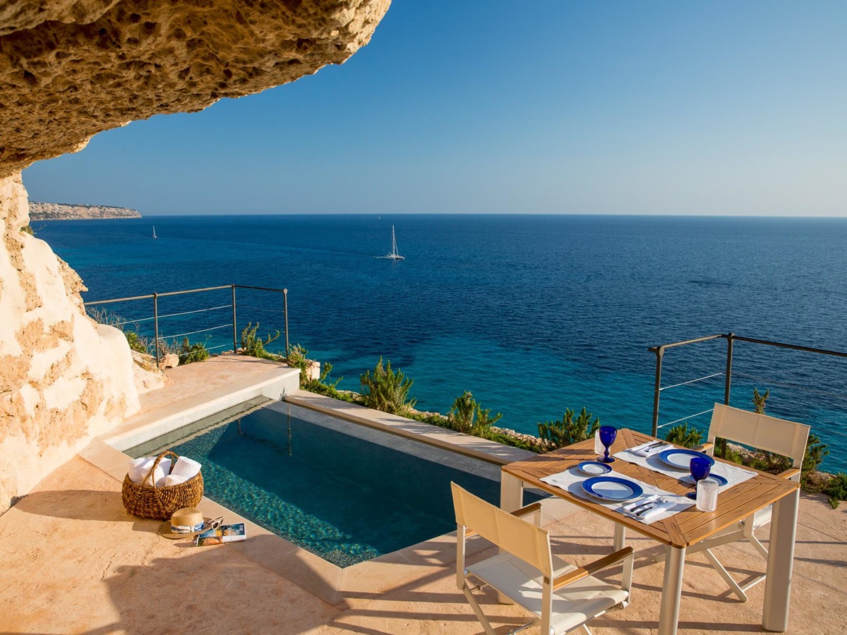 Alfresco dining set up overlooking the ocean at Cap Rocat in Mallorca