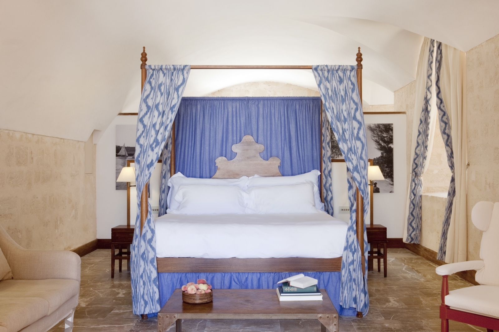 Four poster double bed in a bedroom at luxury resort Cap Rocat on Mallorca,Spain