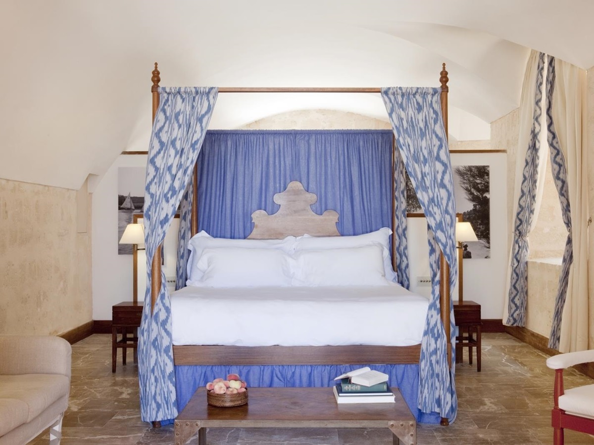 Four poster double bed in a bedroom at luxury resort Cap Rocat on Mallorca,Spain